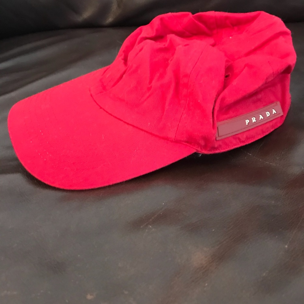 Prada Red baseball hat.